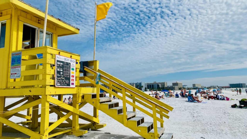 Siesta Key Beach or Siesta Beach showing the yellow lifeguard station.